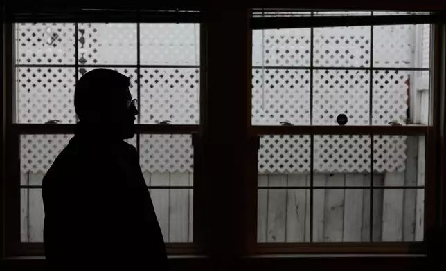 Rohullah R., who did not want his face to be shown or to disclose his last name out of fear of ICE, is photographed at his home in North Highlands, Calif., Friday, Dec. 5, 2025. (AP Photo/Godofredo A. Vásquez)