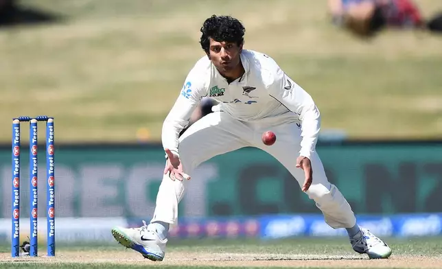 New Zealand's Rachin Ravindra fields against the West Indies on Day 5 of their cricket test match in Christchurch, New Zealand, Saturday, Dec. 6, 2025. (Chris Symes/Photosport via AP)