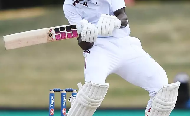 West Indies' Justin Greaves is bothered by a high delivery from New Zealand on Day 5 of their cricket test match in Christchurch, New Zealand, Saturday, Dec. 6, 2025. (Chris Symes/Photosport via AP)
