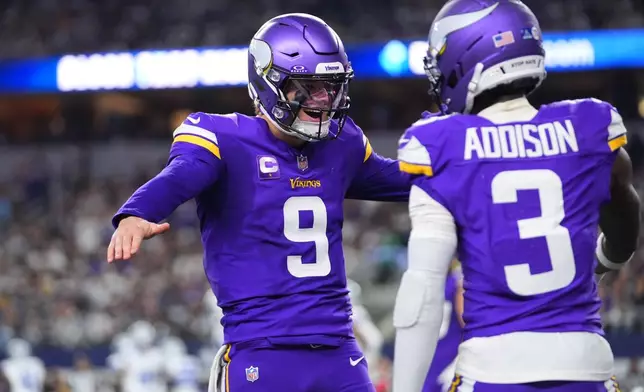 Minnesota Vikings quarterback J.J. McCarthy (9) and wide receiver Jordan Addison celebrate after a touchdown by wide receiver Jalen Nailor during the second half of an NFL football game against the Dallas Cowboys Sunday, Dec. 14, 2025, in Arlington, Texas. (AP Photo/Julio Cortez)