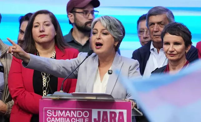 Presidential candidate Jeannette Jara, of the ruling Unity for Chile coalition, concedes to Jose Antonio Kast, of the opposition Republican Party, in the presidential runoff election in Santiago, Chile, Sunday, Dec. 14, 2025. (AP Photo/Natacha Pisarenko)