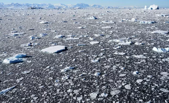 Sea ice covers the ocean at Yalour Islands in Antarctica, Monday, Nov. 24, 2025. (AP Photo/Mark Baker)