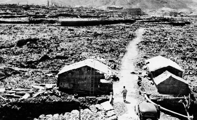 FILE - This Sept. 14, 1945, photo shows shacks made from scraps of debris from buildings that were leveled in the aftermath of the atomic bomb that was dropped over Nagasaki, western Japan. (AP Photo, File)