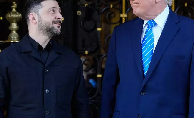 FILE - President Donald Trump greets Ukraine's President Volodymyr Zelenskyy at his Mar-a-Lago club, Sunday, Dec. 28, 2025, in Palm Beach, Fla. (AP Photo/Alex Brandon, File)