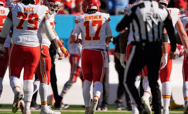 Kansas City Chiefs quarterback Gardner Minshew (17) limps off the field during the first half of an NFL football game against the Tennessee Titans, Sunday, Dec. 21, 2025, in Nashville, Tenn. (AP Photo/George Walker IV)
