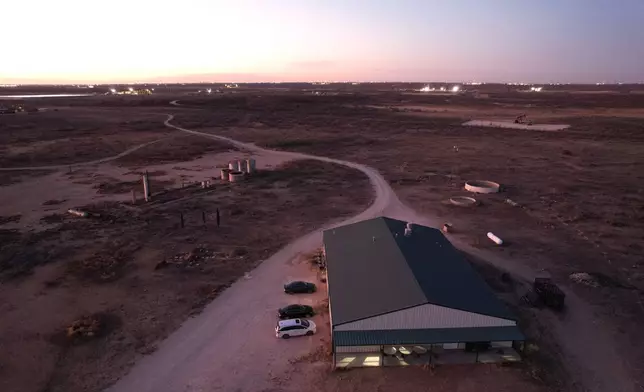 Lights shine inside the Mayflower Church hall, where members of the community gather for religious study or to enjoy downtime, in Midland, Texas, Jan. 19, 2025. (AP Photo/Rebecca Blackwell)