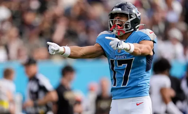 Tennessee Titans wide receiver Chimere Dike (17) reacts after making a first down reception against the New Orleans Saints in the first half of an NFL football game, Sunday, Dec. 28, 2025, in Nashville, Tenn. (AP Photo/George Walker IV)