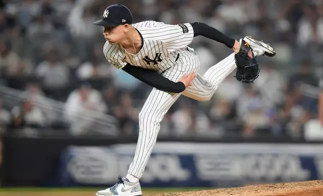 FILE - New York Yankees' Luke Weaver pitches during the seventh inning of a baseball game against the Minnesota Twins Monday, Aug. 11, 2025, in New York. (AP Photo/Frank Franklin II, File)
