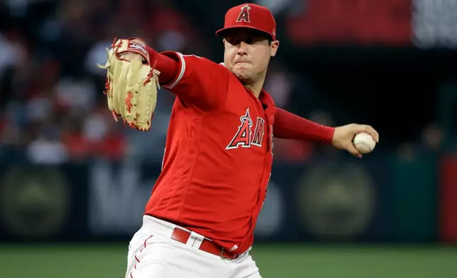 FILE - In this June 29, 2019, file photo, Los Angeles Angels starting pitcher Tyler Skaggs throws to an Oakland Athletics batter during a baseball game in Anaheim, Calif. (AP Photo/Marcio Jose Sanchez, File)