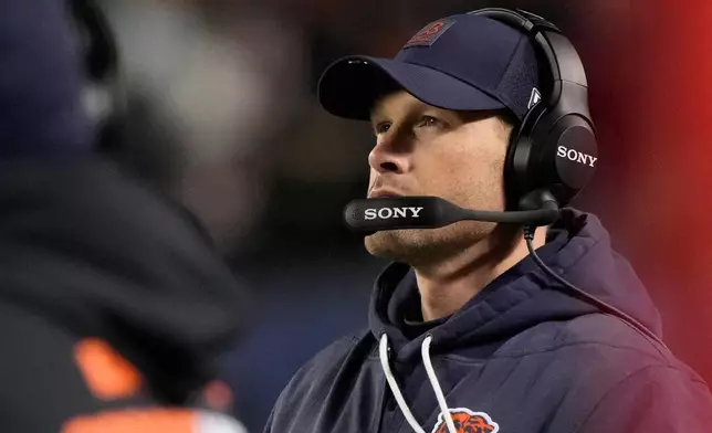 Chicago Bears head coach Ben Johnson watches during the first half of an NFL football game against the Green Bay Packers Saturday, Dec. 20, 2025, in Chicago. (AP Photo/Nam Huh)