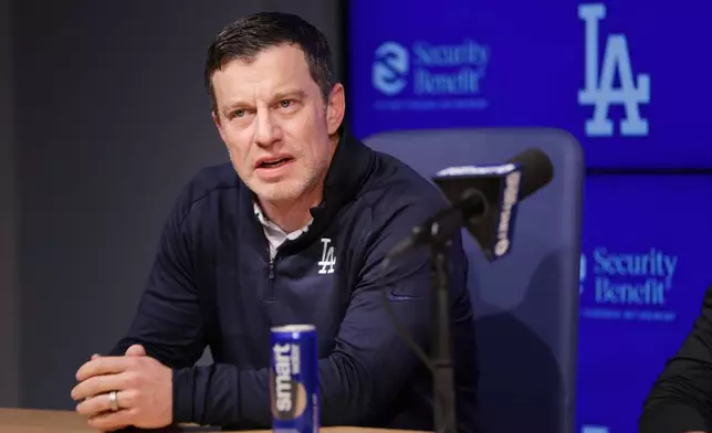 Los Angeles Dodgers President of Baseball Operations Andrew Friedman speaks during an introduction of Edwin Diaz as a new member of the baseball team Friday, Dec. 12, 2025, in Los Angeles. (AP Photo/Ethan Swope)