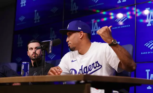 Edwin Díaz speaks during his introduction as a new member of the Los Angeles Dodgers baseball team Friday, Dec. 12, 2025, in Los Angeles. (AP Photo/Ethan Swope)