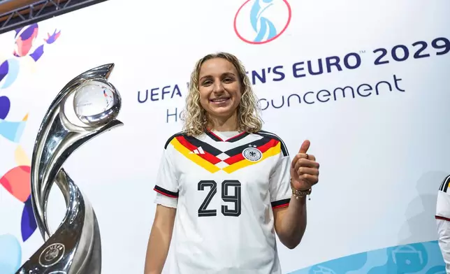 German soccer player Vanessa Diehm poses after Germany was selected to host the 2029 Women's European Championship soccer tournament during a ceremony at UEFA Headquarters, Wednesday, Dec 3, 2025 in Nyon, Switzerland. (Cyril Zingaro/Keystone via AP)
