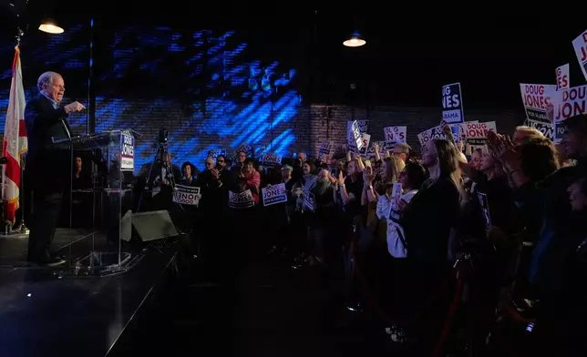 Former Sen. Doug Jones, D-Ala., and gubernatorial candidate speaks during an event Friday, Dec. 12, 2025, in Birmingham, Ala. (AP Photo/Brynn Anderson)