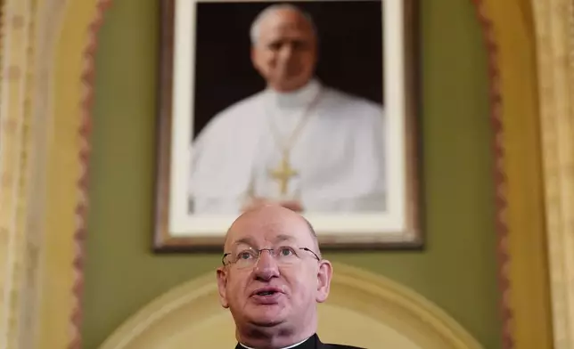 Bishop Richard Moth speaks during a press conference announcing him as the new Archbishop of Westminster, replacing Cardinal Vincent Nichols as the leader of the Catholic Church in England and Wales, in the Throne Room of Archbishop's House, Westminster, London, Friday Dec. 19, 2025. (Jonathan Brady/PA via AP)