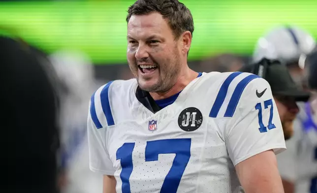 Indianapolis Colts quarterback Philip Rivers reacts during the second half of an NFL football game against the Seattle Seahawks, Sunday, Dec. 14, 2025, in Seattle. (AP Photo/Stephen Brashear)
