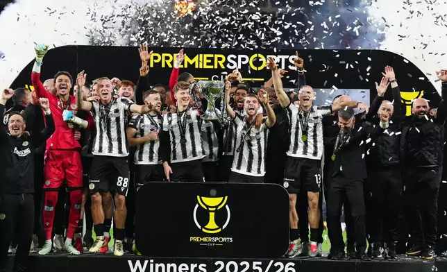 St Mirren players celebrate after the final whistle of the Scottish Premier Sports Cup final against Celtic, in Glasgow, Scotland, Sunday, Dec. 14, 2025. (Jane Barlow/PA via AP)