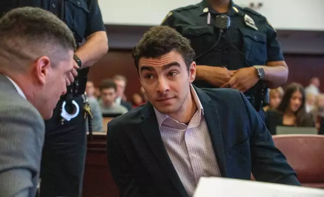 Luigi Mangione appears in Manhattan Criminal Court for an evidence hearing, Tuesday, Dec. 2, 2025, in New York. (Steven Hirsch/New York Post via AP, Pool)