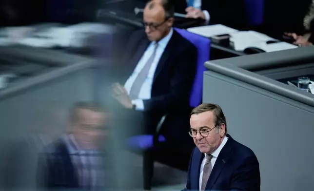 German Defense Minister Boris Pistorius speaks during a meeting about conscription of the German Parliament in Berlin, Germany, Friday, Dec.5, 2025. (AP Photo/Ebrahim Noroozi)