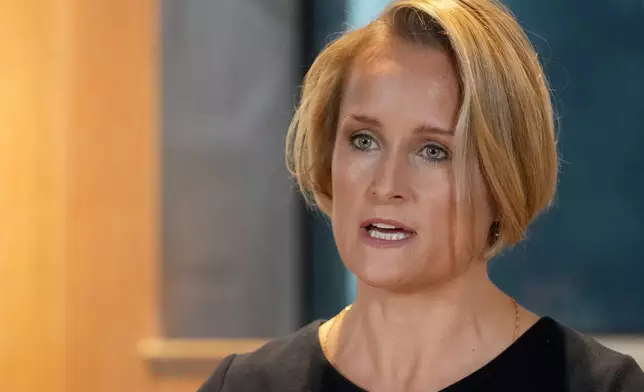 The new head of Britain's MI6 Blaise Metreweli makes her first public speech in London, Monday, Dec. 15, 2025. (AP Photo/Kirsty Wigglesworth,pool)