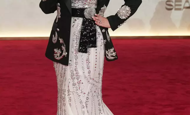 Aishwarya Rai Bachchan arrives for the opening of the Red Sea International Film Festival in Jeddah, Saudi Arabia, Thursday, Dec. 4, 2025. (AP Photo/Amr Nabil)