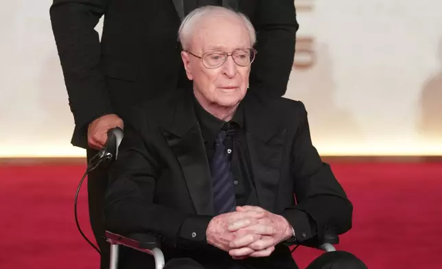 Michael Caine arrives for the opening of the Red Sea International Film Festival in Jeddah, Saudi Arabia, Thursday, Dec. 4, 2025. (AP Photo/Amr Nabil)