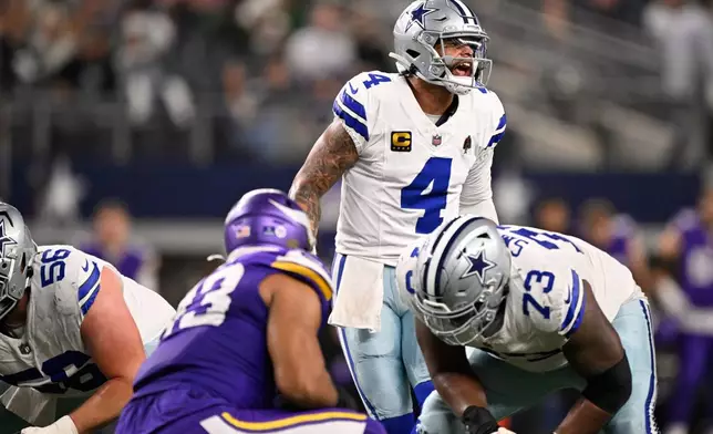 Dallas Cowboys quarterback Dak Prescott yells as he starts a play during the second half of an NFL football game against the Minnesota Vikings Sunday, Dec. 14, 2025, in Arlington, Texas. (AP Photo/Jerome Miron)