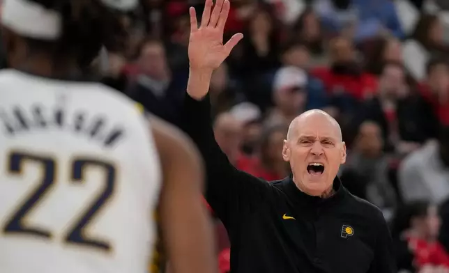 Indiana Pacers head coach Rick Carlisle yells to his team during the first half of an NBA basketball game against the Chicago Bulls, Friday, Dec. 5, 2025, in Chicago. (AP Photo/Erin Hooley)