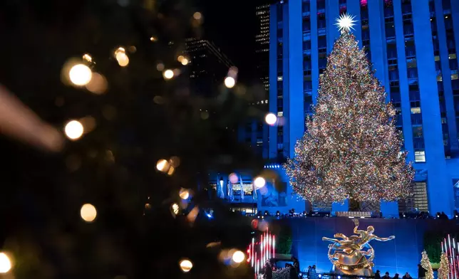 The Rockefeller Center Christmas tree after being lit during the 93rd annual Rockefeller Center Christmas tree lighting ceremony, Wednesday, Dec. 3, 2025, in New York. (AP Photo/Yuki Iwamura)
