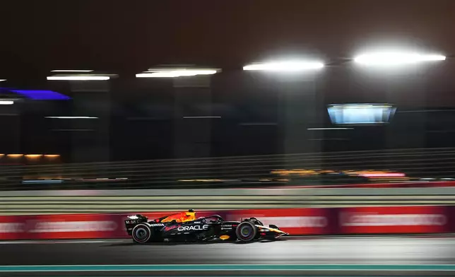 Red Bull driver Max Verstappen of the Netherlands steers his car during the Formula One Abu Dhabi Grand Prix at the Yas Marina Circuit in Abu Dhabi, UAE, Sunday, Dec. 7, 2025. (AP Photo/Fatima Shbair)