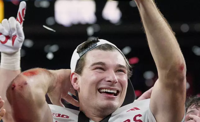 FILE - Indiana's Fernando Mendoza celebrates after the Big Ten championship NCAA college football game against Ohio State in Indianapolis, Saturday, Dec. 6, 2025. (AP Photo/AJ Mast, File)