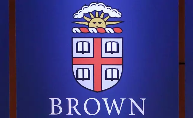 FILE - The logo for Brown University is displayed at the school's campus in Providence, R.I., on Wednesday, April 25, 2018. (AP Photo/Steven Senne, File)