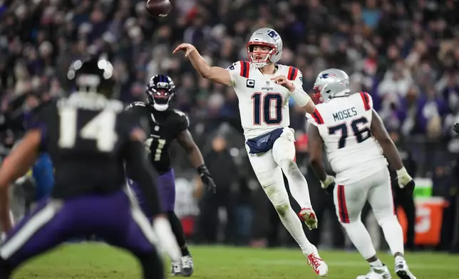 New England Patriots quarterback Drake Maye (10) passes against the Baltimore Ravens during the second half of an NFL football game, Sunday, Dec. 21, 2025, in Baltimore. (AP Photo/Stephanie Scarbrough)