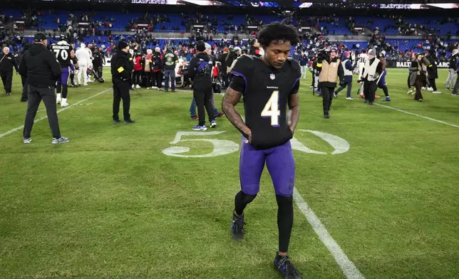 Baltimore Ravens wide receiver Zay Flowers (4) walks off the field after an NFL football game against the New England Patriots, Sunday, Dec. 21, 2025, in Baltimore. (AP Photo/Nick Wass)
