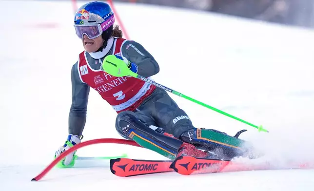 Brazil's Lucas Pinheiro Braathen speeds down the course during an alpine ski, men's World Cup slalom event, in Val d'Isere, France, Sunday Dec. 14, 2025. (AP Photo/Giovanni Auletta)