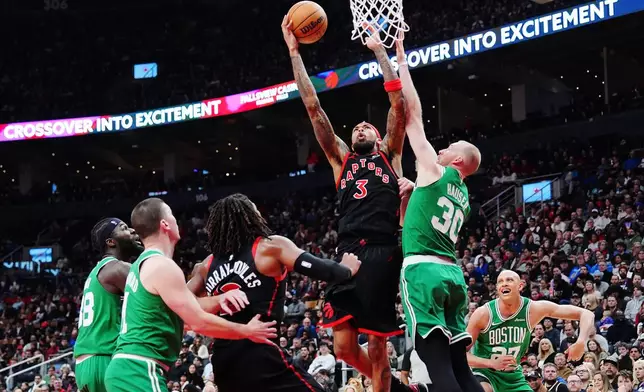 Toronto Raptors' Brandon Ingram (3) shoots over Boston Celtics' Sam Hauser (30) during first-half NBA basketball game action in Toronto, Saturday, Dec. 20, 2025. (Frank Gunn/The Canadian Press via AP)