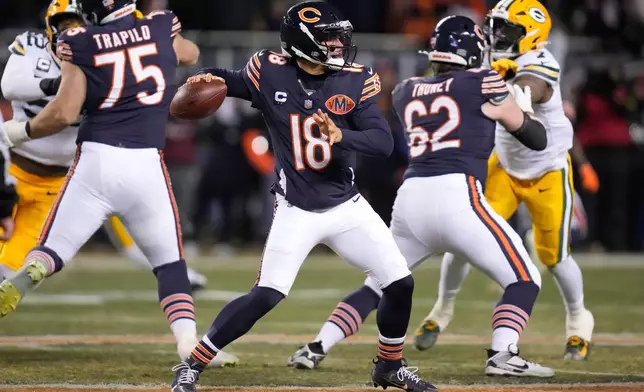 Chicago Bears' Caleb Williams throws during the first half of an NFL football game against the Green Bay Packers Saturday, Dec. 20, 2025, in Chicago. (AP Photo/Erin Hooley)