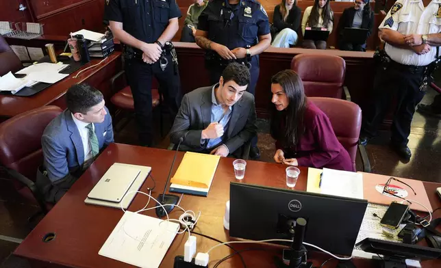 Luigi Mangione appears in Manhattan Criminal Court, Monday, Dec. 8, 2025, in New York. (Curtis Means /Pool Photo via AP)