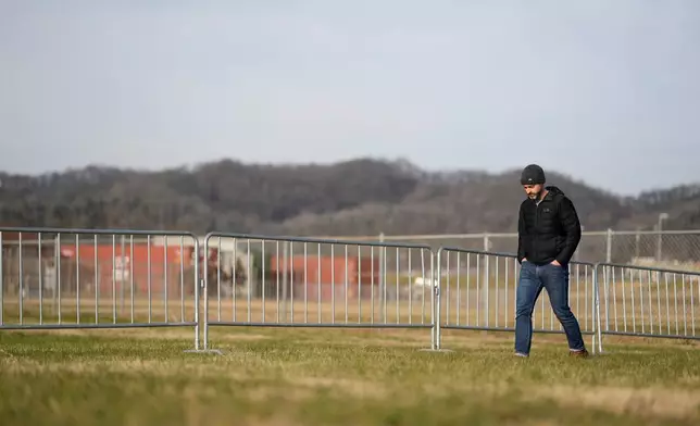 An anti-death penalty demonstrator paces in an area reserved for protesting outside Riverbend Maximum Security Institution before the execution of Harold Wayne Nichols, Thursday, Dec. 11, 2025, in Nashville, Tenn. (AP Photo/George Walker IV)