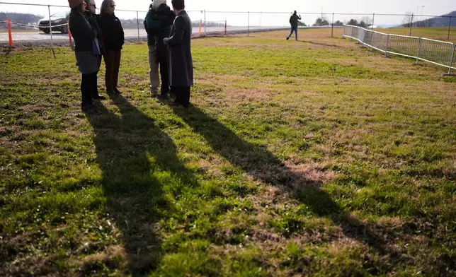 People gather in the area reserved for anti-death penalty demonstrators outside Riverbend Maximum Security Institution before the execution of Harold Wayne Nichols, Thursday, Dec. 11, 2025, in Nashville, Tenn. (AP Photo/George Walker IV)