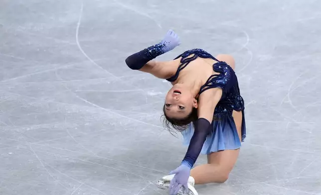 Kaori Sakamoto, of Japan, competes in the women's short program segment at the ISU Grand Prix of Figure Skating Final in Nagoya, central Japan, Friday, Dec. 5, 2025. (AP Photo/Hiro Komae)