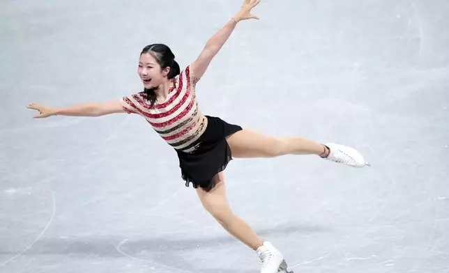 Ami Nakai, of Japan, competes in the women's short program segment at the ISU Grand Prix of Figure Skating Final in Nagoya, central Japan, Friday, Dec. 5, 2025. (AP Photo/Hiro Komae)