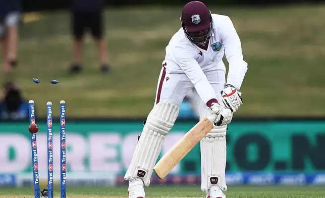 West Indies' batter Ojay Shields is bowled by New Zealand's Jacob Duffy during the second day of their cricket test match in Christchurch, New Zealand, Wednesday, Dec. 3, 2025. (Chris Symes/Photosport via AP)