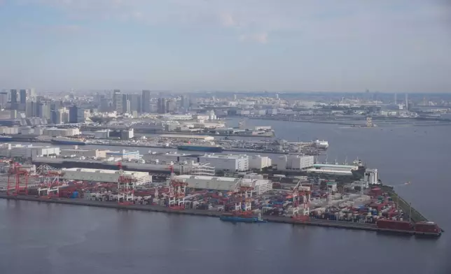 A general view of a container port seen from a helicopter in Tokyo, on Oct. 29, 2025. (AP Photo/Mark Schiefelbein)