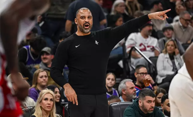 Houston Rockets head coach Ime Udoka directs his players during the first half an NBA basketball game against the Sacramento Kings, Sunday, Dec. 21, 2025, in Sacramento, Calif. (AP Photo/Justine Willard)
