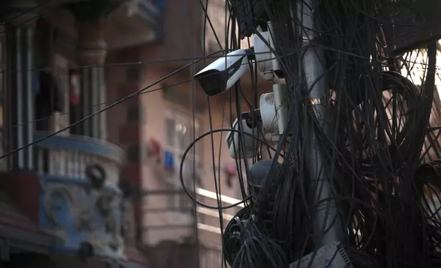 Dahua surveillance cameras monitor the streets of Kathmandu, Nepal, April 22, 2025. (AP Photo/Dake Kang)