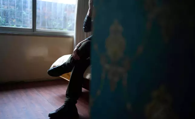 A Tibetan living in exile shares his story during an interview in Kathmandu, Nepal, April 14, 2025. (AP Photo/Niranjan Shrestha)