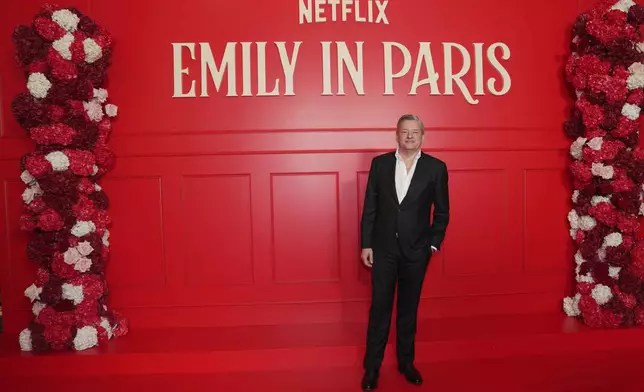Ted Sarandos poses for the World Premiere of the Netflix Series "Emily in Paris" season 5, in Paris, France, Monday, Dec. 15, 2025. (AP Photo/Aurelien Morissard)