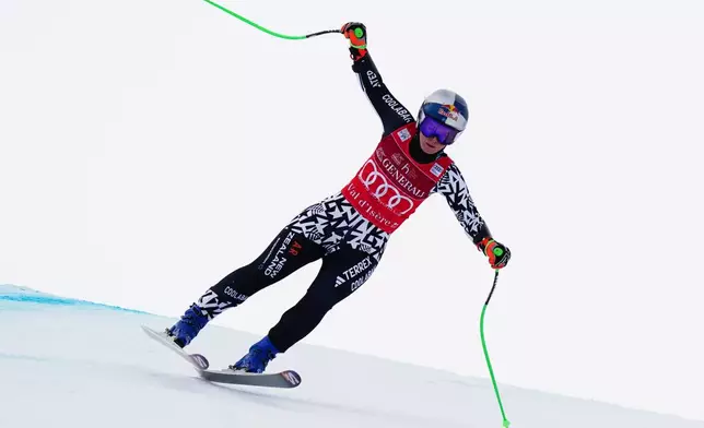 New Zealand's Alice Robinson speeds down the course during an alpine ski, women's World Cup super-G in Val d'Isere, France, Sunday, Dec. 21, 2025. (AP Photo/Pier Marco Tacca)