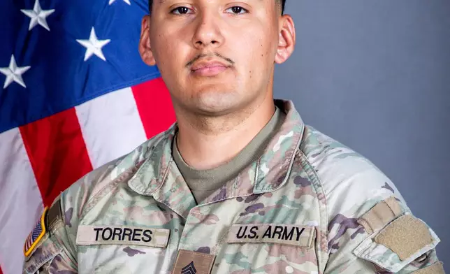 This undated photo released by the Iowa National Guard shows Sgt. Edgar Brian Torres-Tovar. (Iowa National Guard via AP)